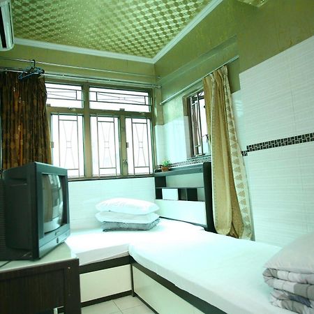 H K Commercial Inn Цзюлун Экстерьер фото