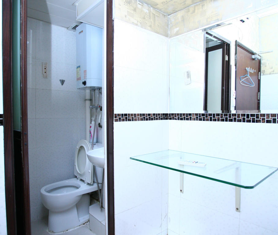 H K Commercial Inn Цзюлун Номер фото