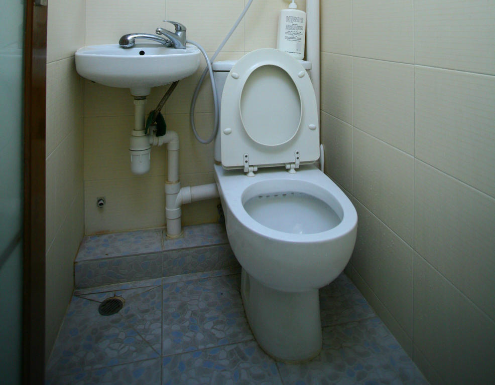 H K Commercial Inn Цзюлун Номер фото
