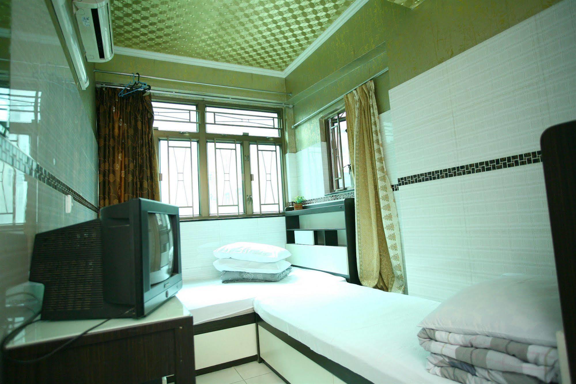 H K Commercial Inn Цзюлун Экстерьер фото